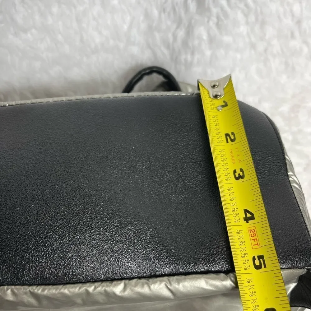 Juicy Couture Metallic quilted silver Backpack with black trim. - Picture 14 of 16